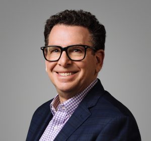 photo of man wearing glasses