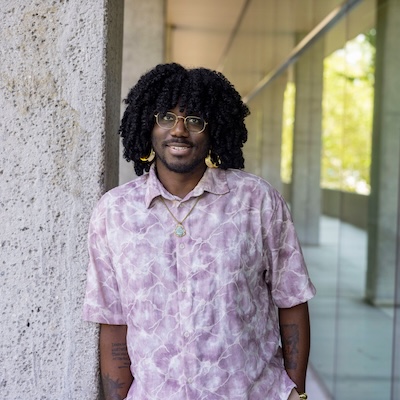 A headshot photograph featuring Brandon Laurent.